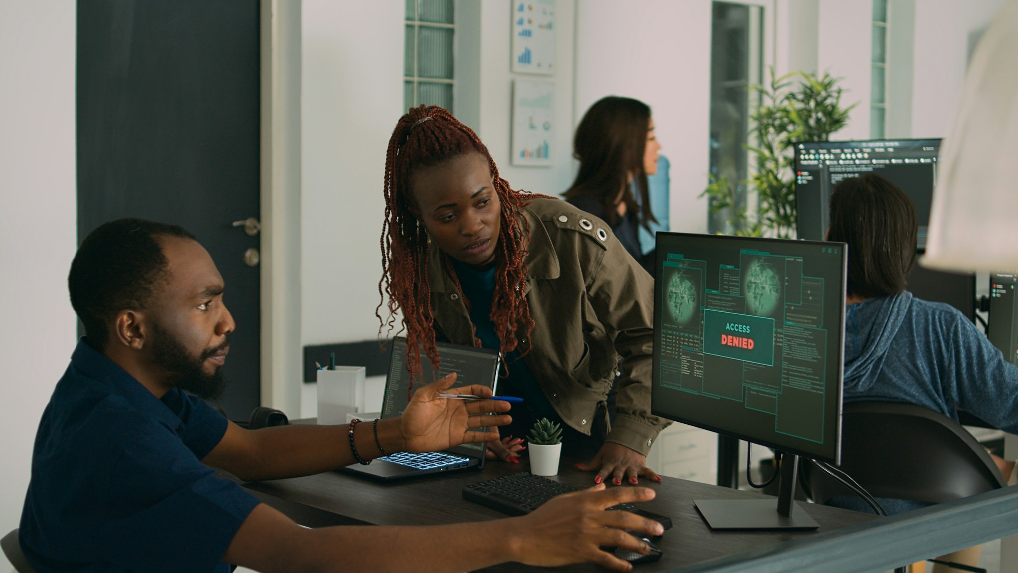 African american team of engineers working on server development